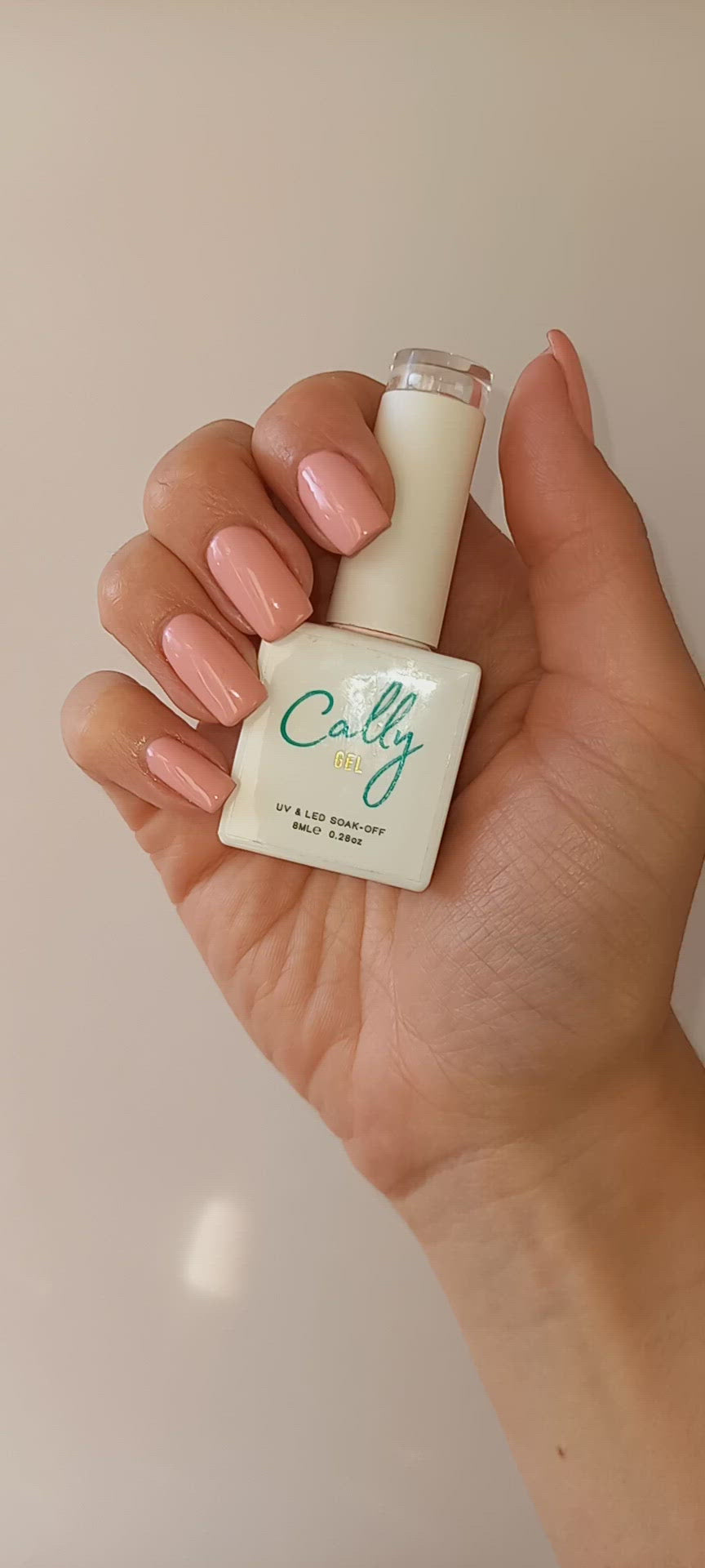 Showing Manicured with Blush Dream Cally Gel Nail Polish and 8ml Bottle in Hand