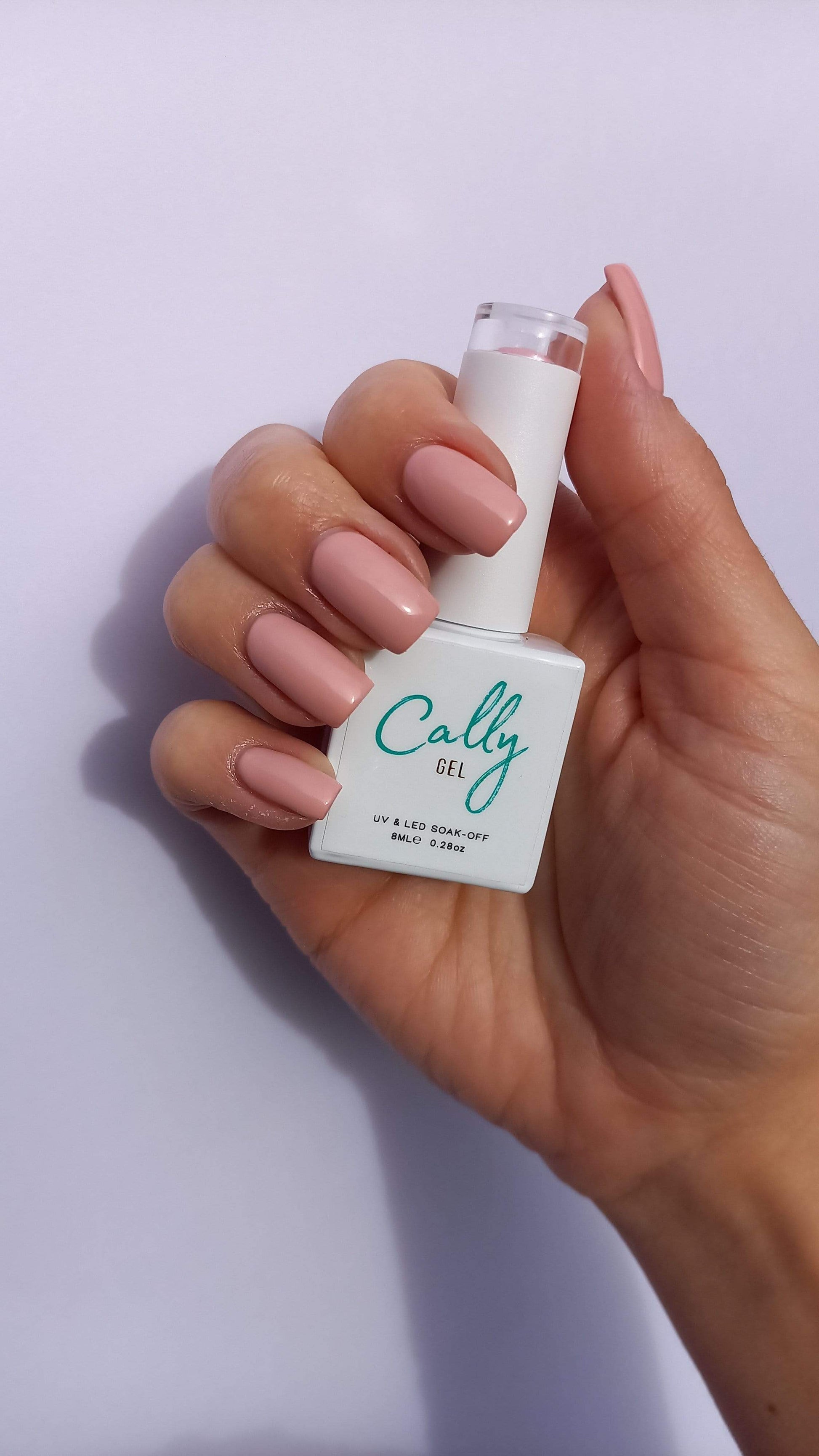 Manicured with Ballet Slippers Cally Gel Nail Polish and Bottle in Hand