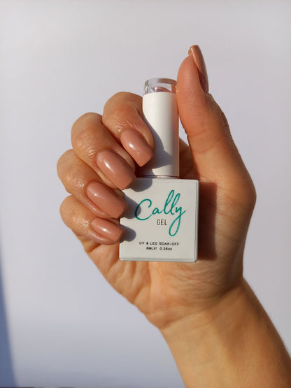 Hand Manicured with Desert Taupe Cally Gel Nail Polish and 8ml bottle in hand