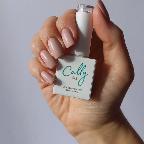 Showing Manicured with Peony Petal Cally Gel Nail Polish and Bottle in Hand