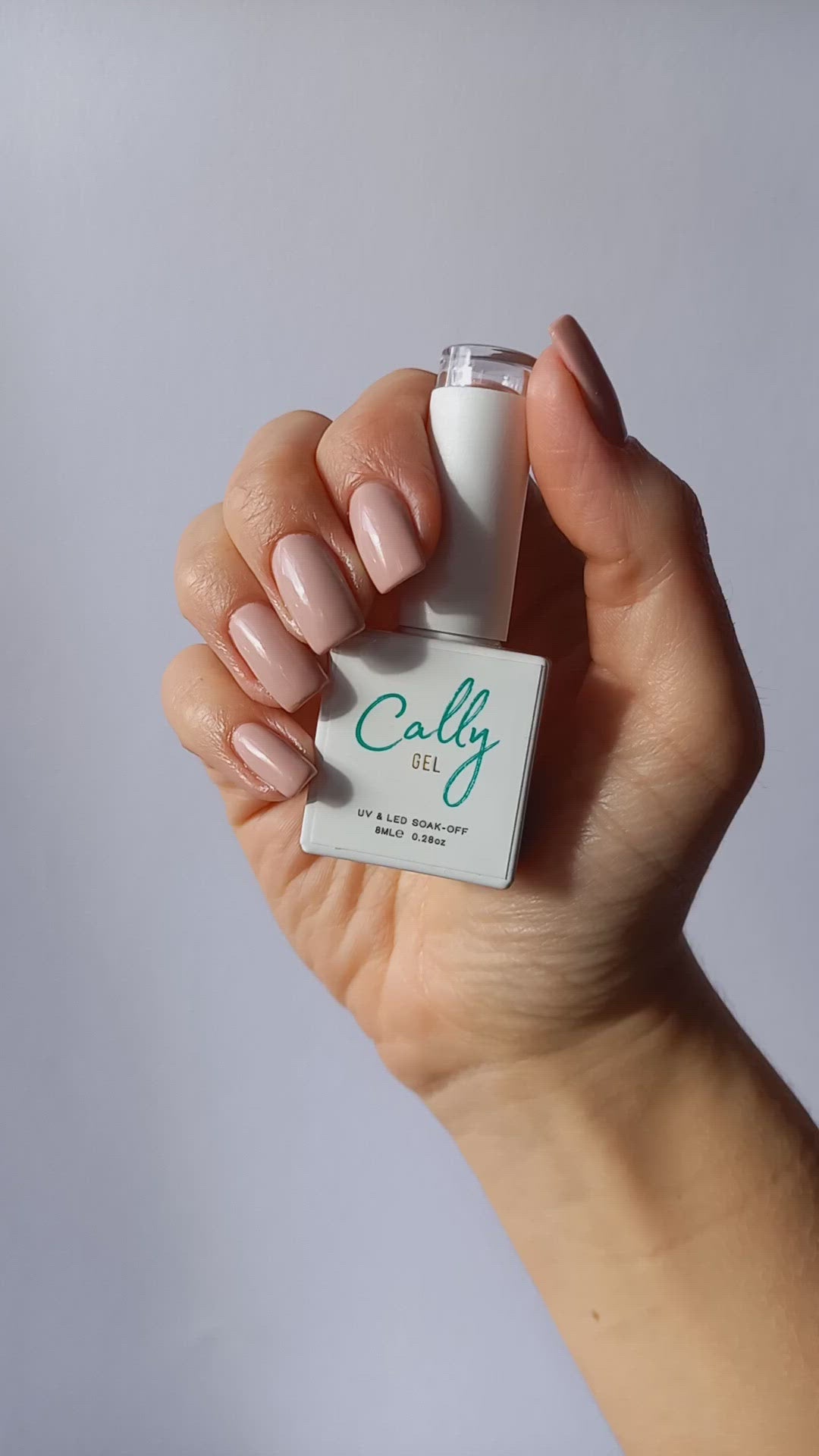 Showing Manicured with Peony Petal Cally Gel Nail Polish and Bottle in Hand