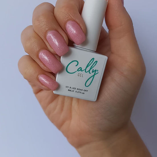 Showing Manicured with Heavenly Pink Cally Gel Nail Polish and 8ml Bottle in Hand