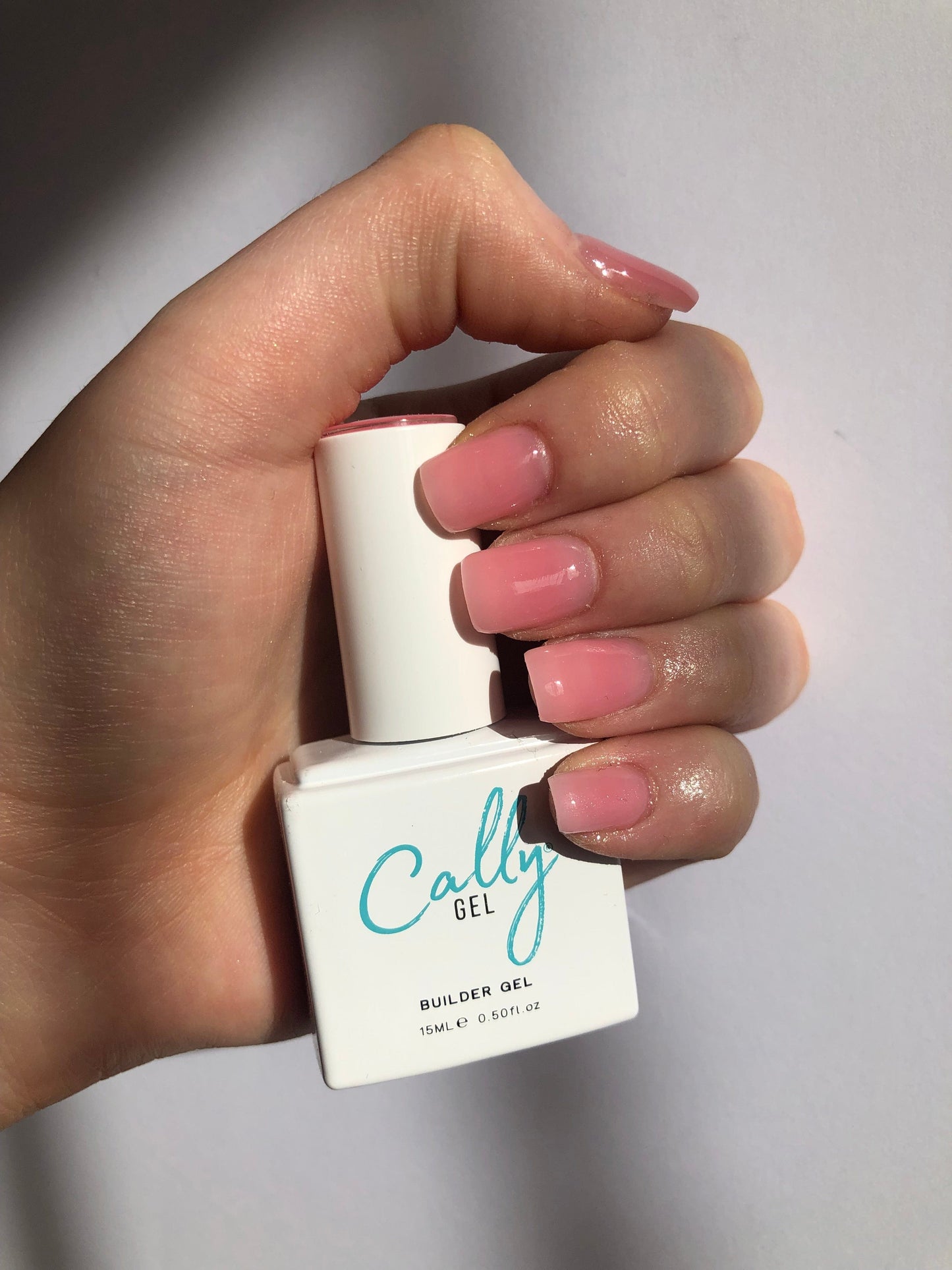 Hand Manicured with Dream Cally Builder Gel Nail Polish and Bottle in Hand
